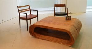 Luxury solid wood dining table Kuwait 2025, custom handmade one-piece artisan design, unique grain, priced 18,000–650,000 AED, crafted for elite interiors