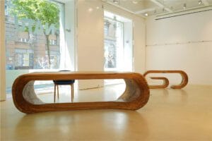 Custom, handmade luxury oak table crafted from a single piece, priced 18,000–650,000 AED; experience ultimate UAE exclusivity and artisan craftsmanship